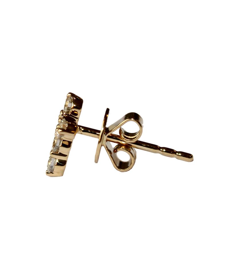 Cross Earrings Stud taken from aside angle- Tess Van Ghert - 3 Featuring diamonds and women cross earrings gold